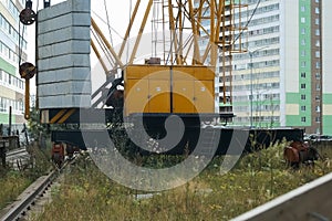 Tower crane with counterweight on construction site for build high buildings.