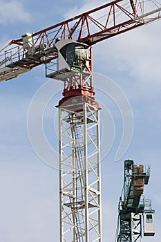 Tower crane machine, operators cab and load concrete weights