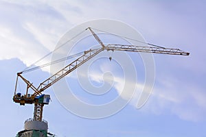 Tower cranes are a modern form of balance crane that used in the construction of tall buildings.