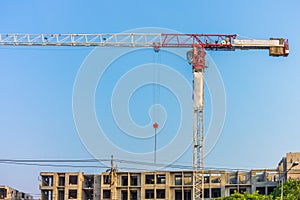 Tower cranes over building
