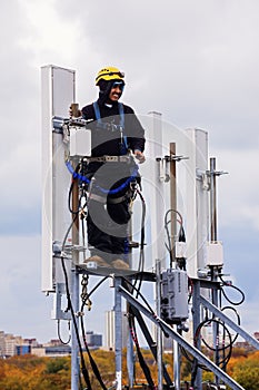 Tower crew leader working with the cellular antennas
