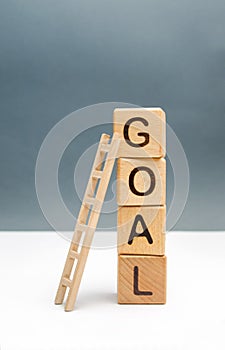 tower of cubes with an inscription goal and a up ladder. The concept of achieving the goal, subject to the application of all
