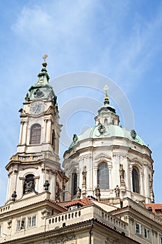 Tower and dome of St. Nicholas Church in Prague