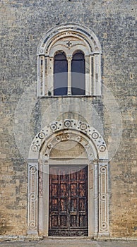 The tower and facade of the Church of Santa Maria in Castello