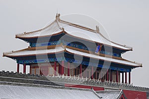 tower gate of forbidden city in snowing