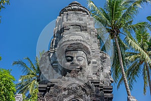 Tower gateway surmounted by four stone faces of Bodhisattva Lokeshvara. Mendut Buddhist Monastery Indonesia