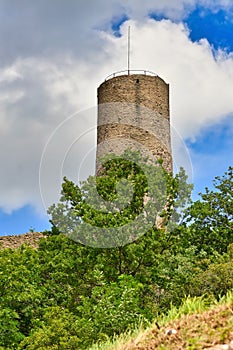 Tower of German castle ruin and restaurant called Strahlenburg in Odenwald forest in Schriesheim