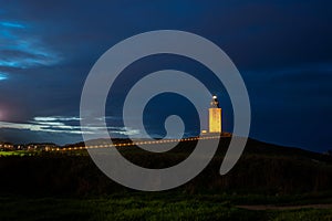 tower of hercules and access road at sunset