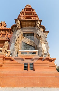 Tower of historic Baron Empain Palace, architecture inspired by Cambodian Hindu temple of Angkor Wat