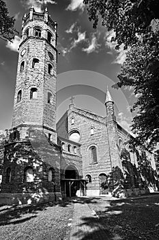 The tower of the historic, Gothic red brick church in the city of Skwierzyna