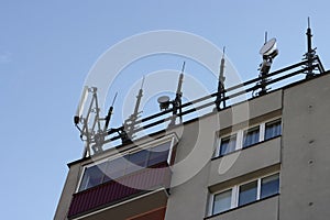Tower house with gsm antenas photo