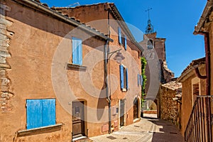 A narrow street in the beautiful French ocher village of Roussillon