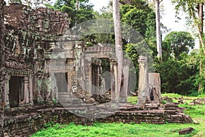 Tower, huge trees and galleries in Preah Khan Temple