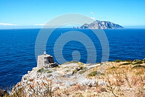 The tower and lighthouse of Punta Campanella at Sorrento photo