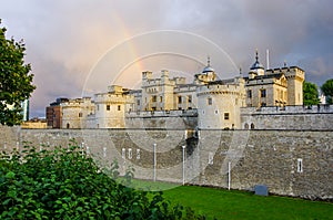 Tower of London with rainbow and cloudy sky photo