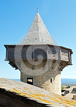 Tower with machicolation