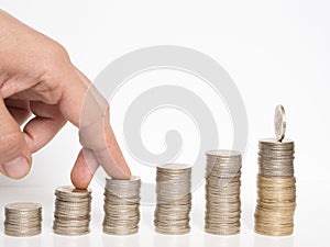 Tower made with coins concept image, increasing value of money