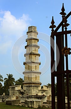 The tower of Manora fort with gate silhouette.