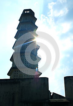 The tower of Manora fort with sun rays.