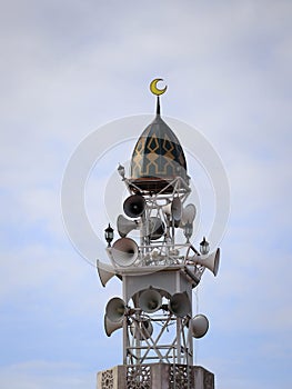 a tower with many loud speaker