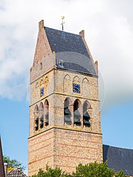 Tower of Martinikerk Church in old town of Bolsward, Friesland,