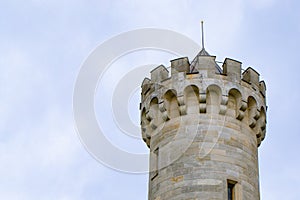 Old German castle tower with arrow slits. photo