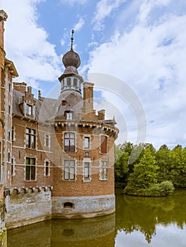 Tower and moat in Ooidonk castle