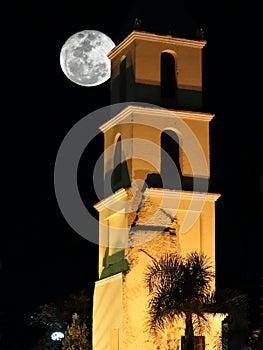 Tower with moon photo