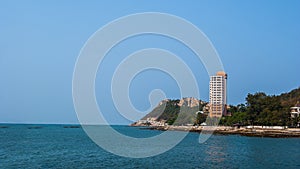 Tower near sea with blue sky