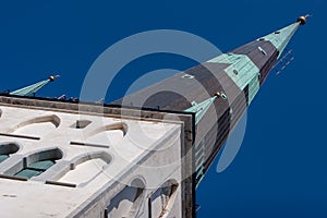 Tower Oleviste in the old city of Tallinn with the sky.