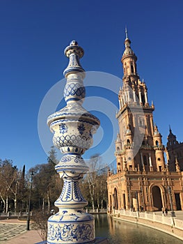 Tower of Plaza de Espana in Seville with architecture detail photo