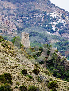 Tower on rocky coast, seaside cliffs, Spain