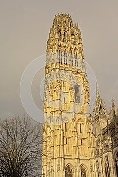 Tower of the roman catholic cathedral of Rouen on dark sky, France