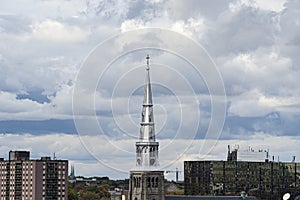 The tower of Saint Jacques Church is under construction on St. Denis street in Montreal, Quebec, Canada.
