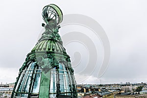 Tower of Singer House or Zinger house - dome and bronze sculptures