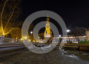 Tower in the Spain square in Seville at night. One of the most important places of the city