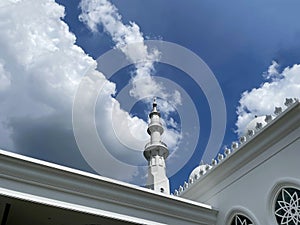 Tower Standing Tall During The Day With Cloudy Sky Background