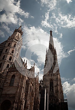 The tower of Stephansdom, the big cathedral in the city center of Viena, Austria photo