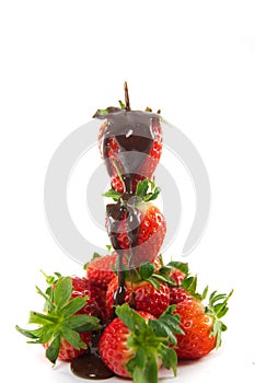 Tower of strawberries with melted chocolate