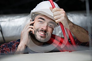 tower technician talking on cell phone