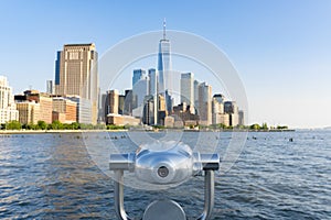 Tower telescope facing Manhattan skyline in New York City