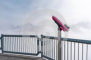 Tower viewer binoculars on top of a mountain in Switzerland