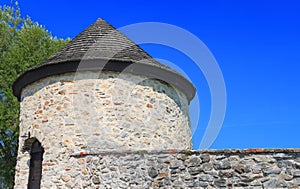 Tower with wooden roof as part of Red stone castle, Casta village, Slovakia