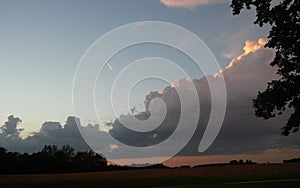 Towering clouds at sunset