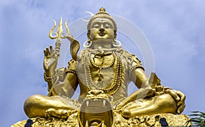 Towering golden statue of Deity Shankar