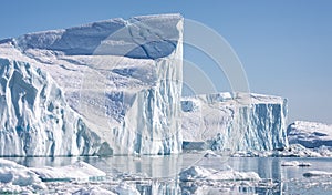 Towering great icebergs in the Ilulissat Icefjord in Greenland