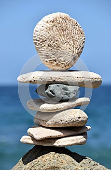 Towering Stack of Meditation Stones by the Ocean