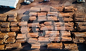 A Towering Stack of Timber on a Rustic Landscape