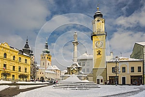 Towers of Banska Bystrica during winter with snow