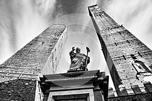 Towers of Bologna and statue of St. Petronius